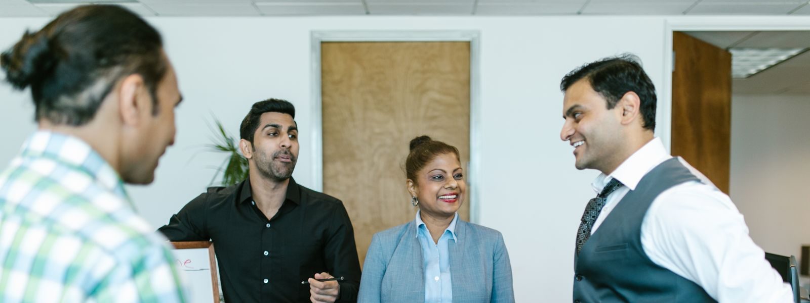 Colleagues collaborating in a modern office
