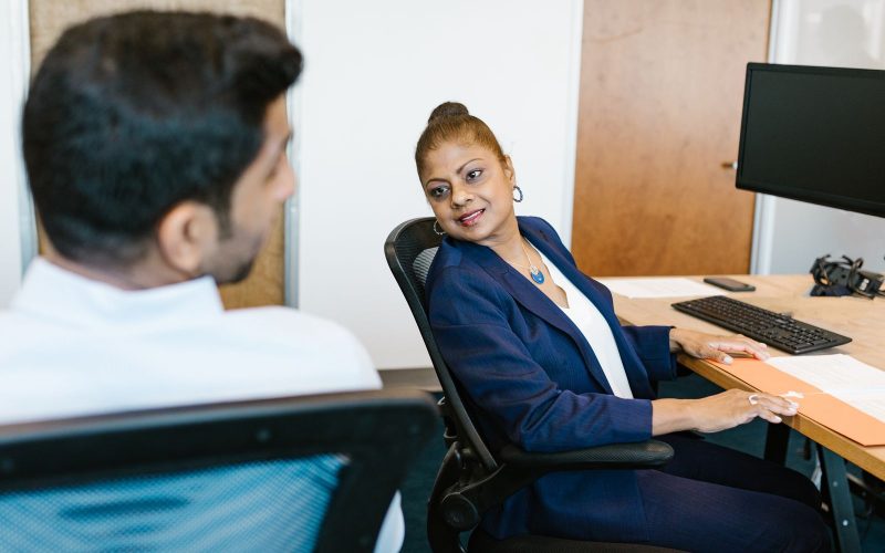A mentor guiding a professional through their career plan