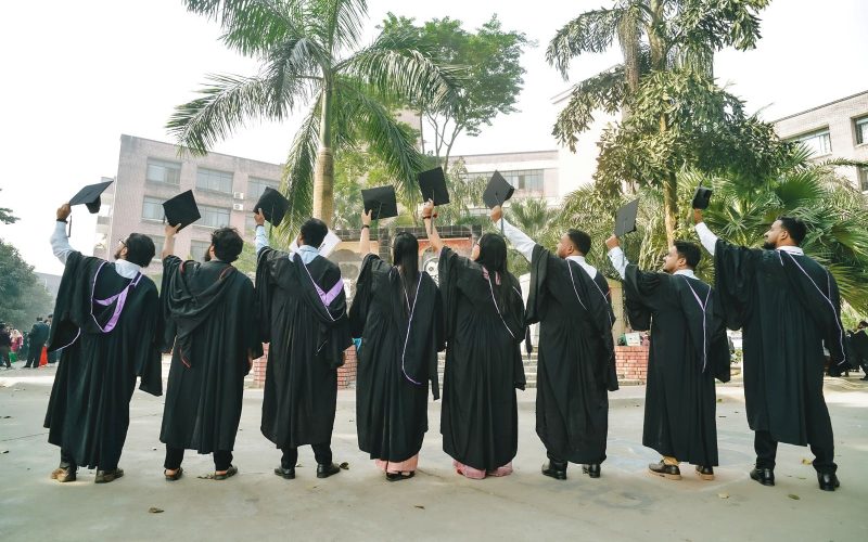 Graduates celebrating at a certification ceremony