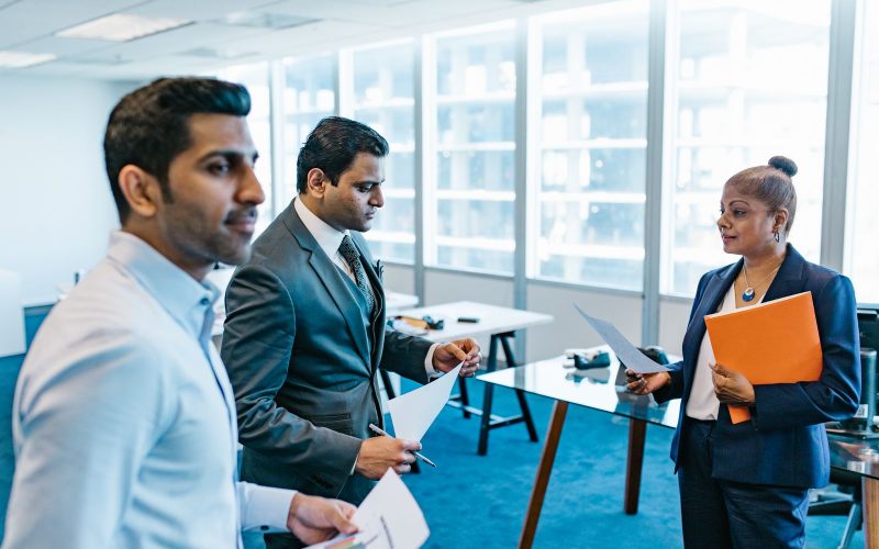 An interviewer reviewing a candidate during a hiring conversation